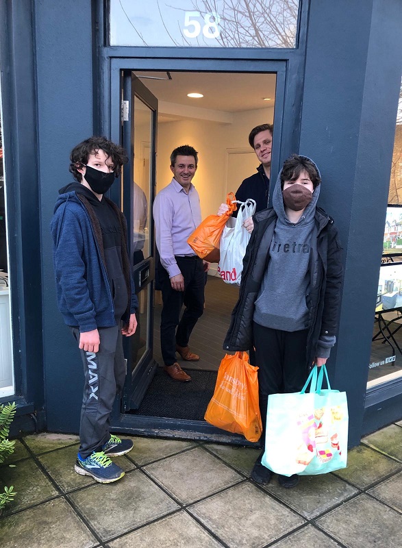 Students Kai and Ariel collecting for local foodbank